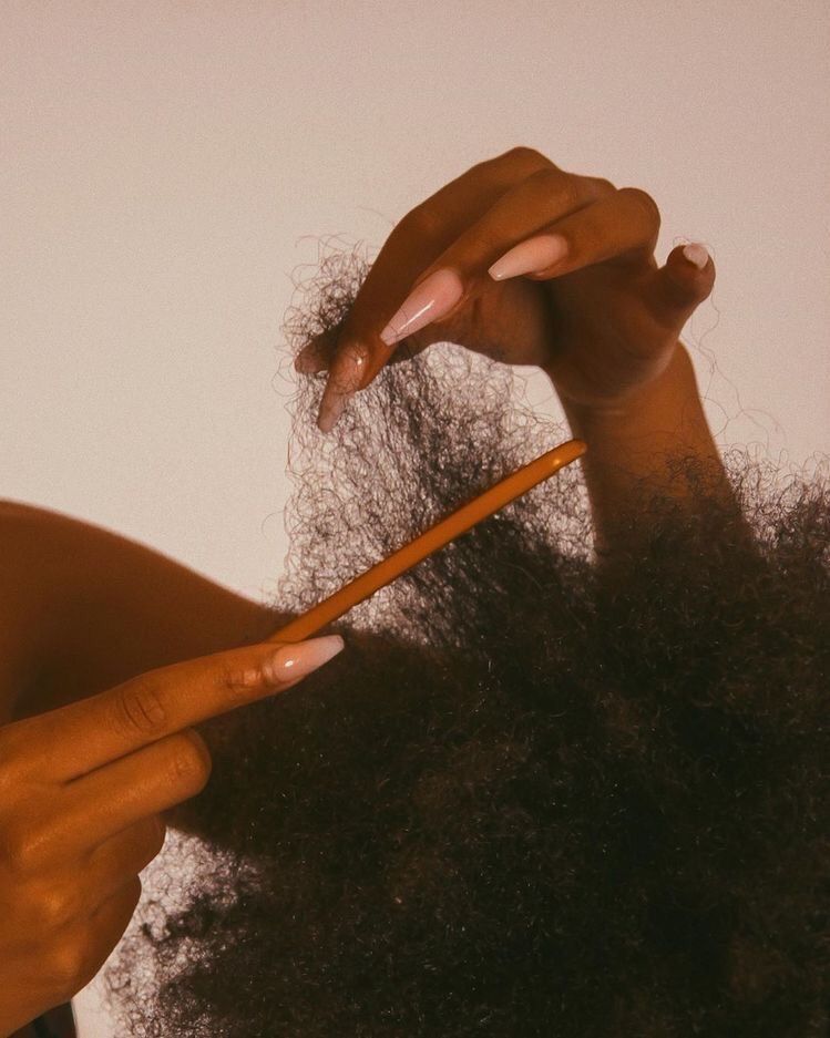 Afro Textured Hair with Comb
