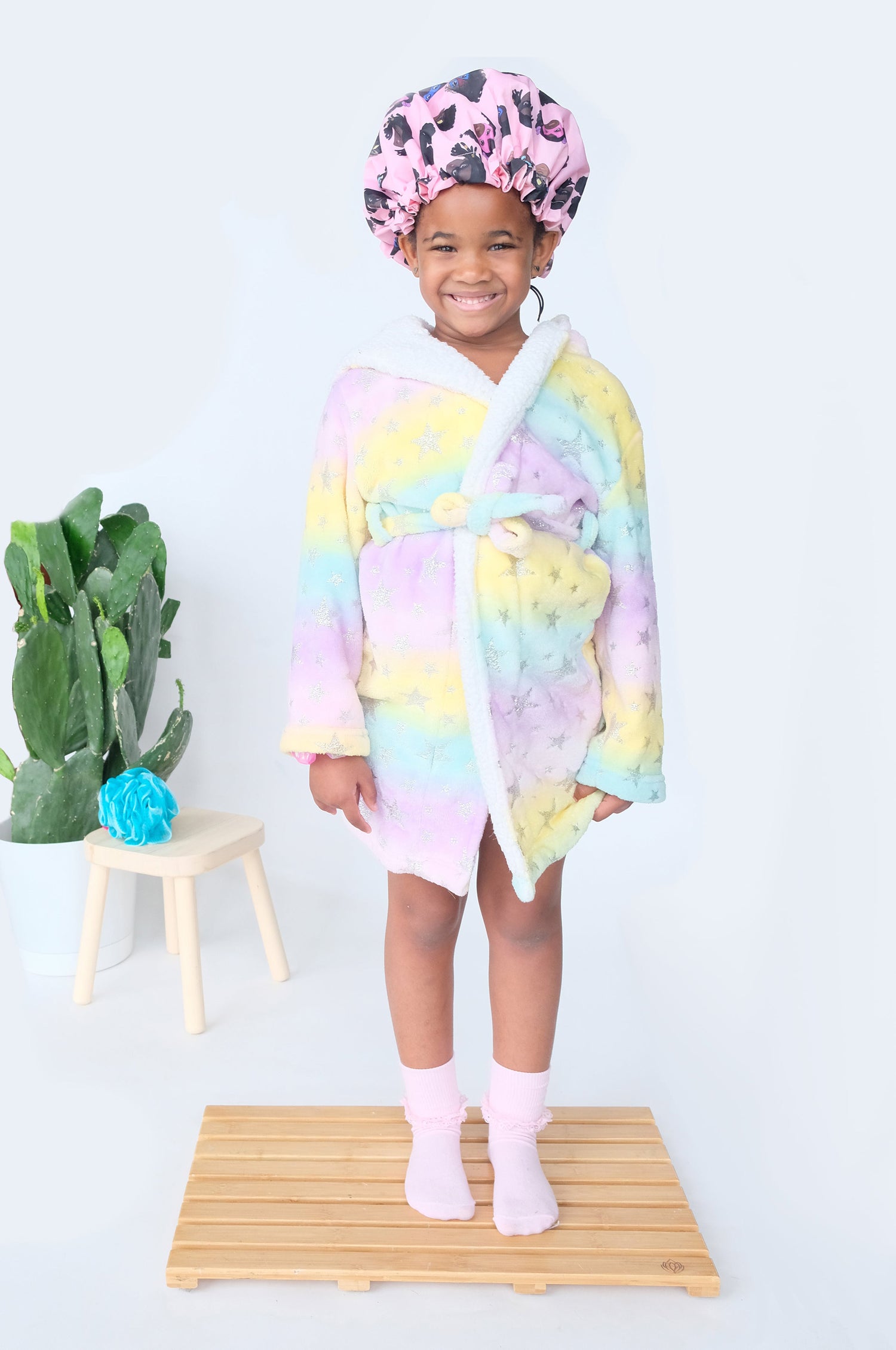 Child in Children's Pink Shower Cap