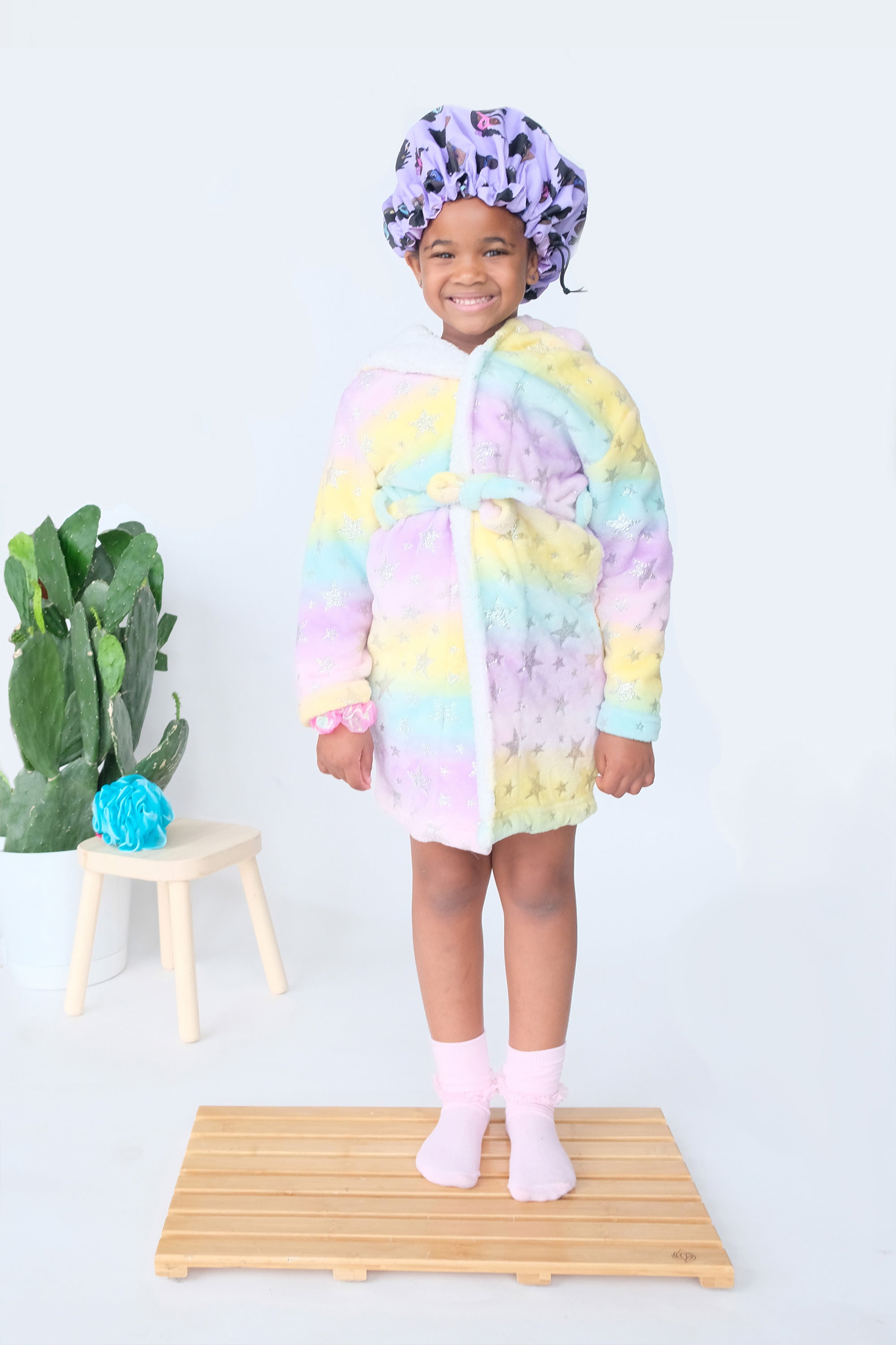 Child in Children's Purple Shower Cap